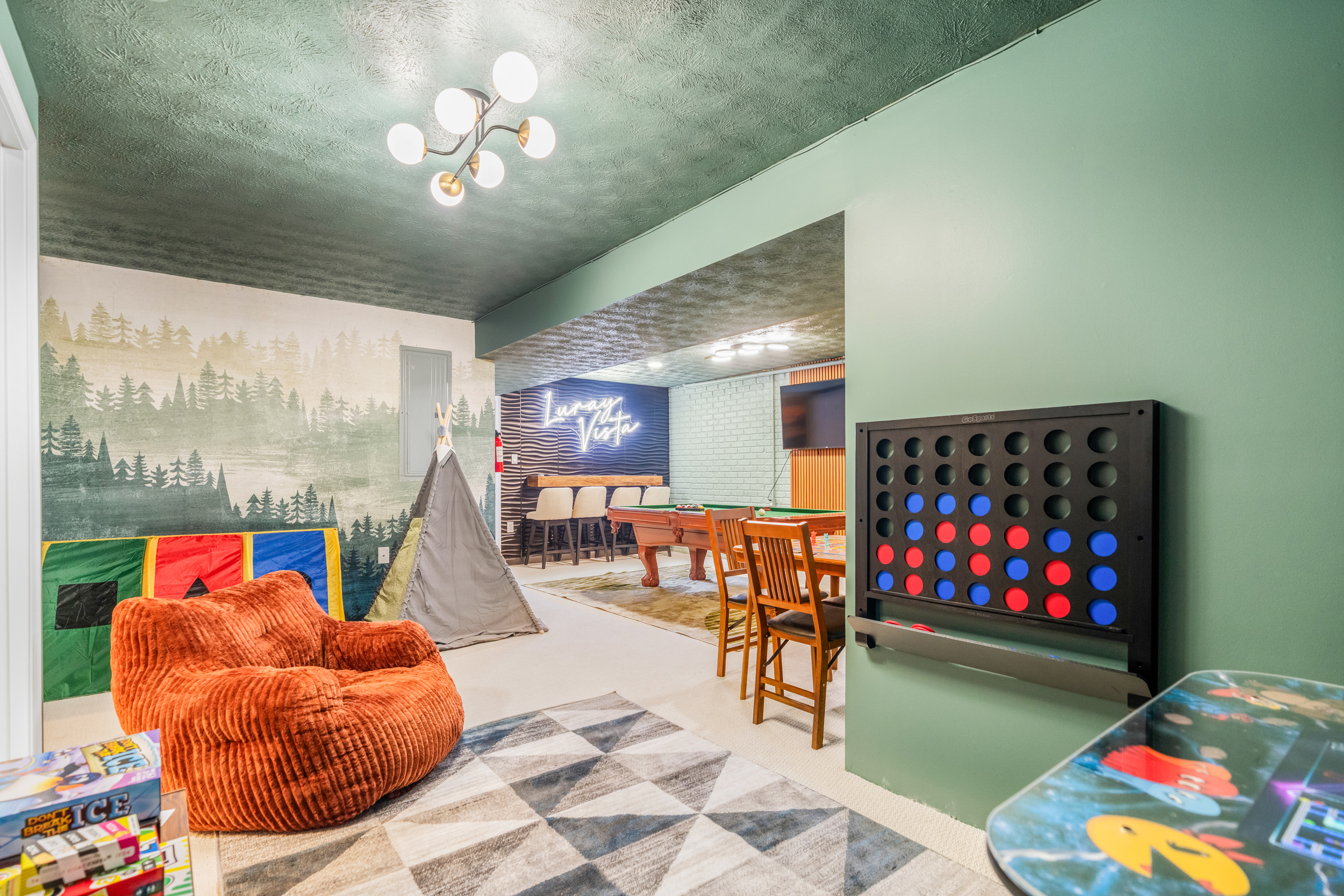 Game room with arcade and billiards